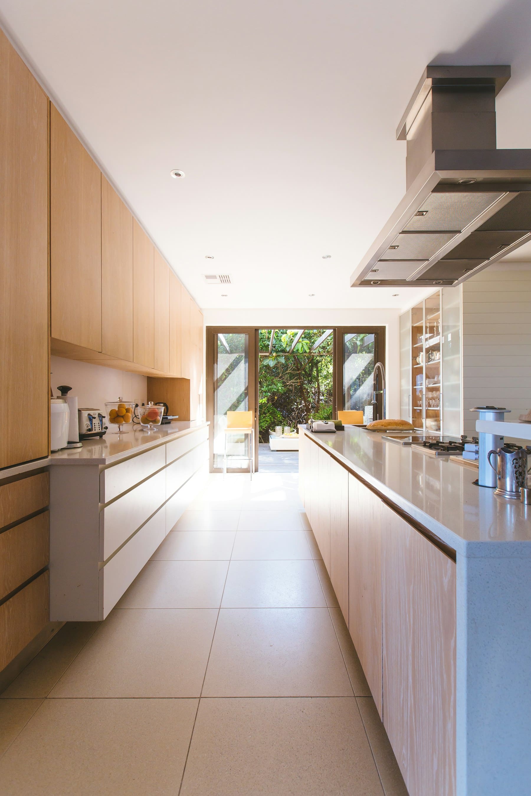 Bright, freshly cleaned modern kitchen with spotless worktops.